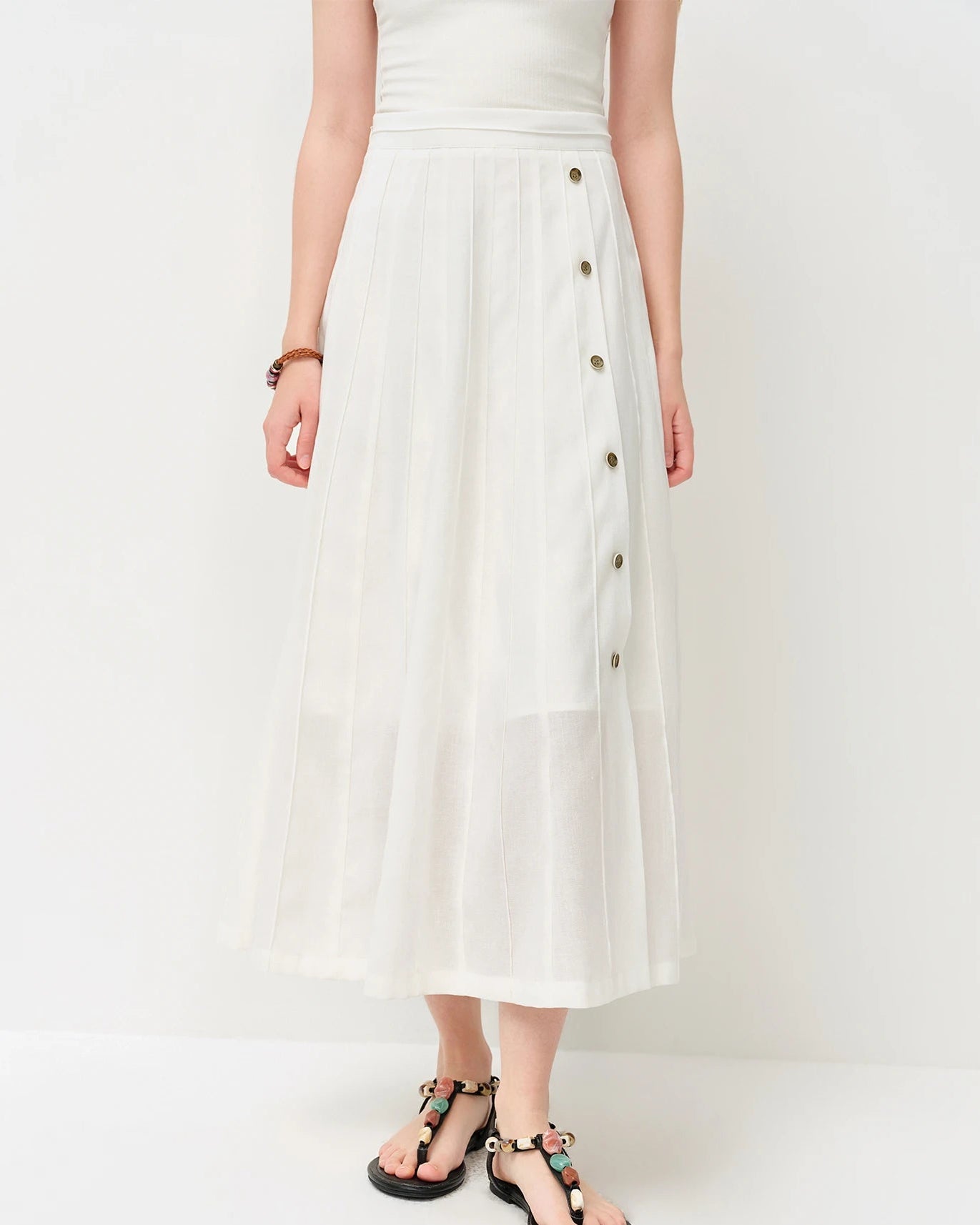 Premium relaxed woven solid ankle skirt in a soft solid color, offering a modest silhouette for ultimate comfort during daily activities or weekend relaxation.
