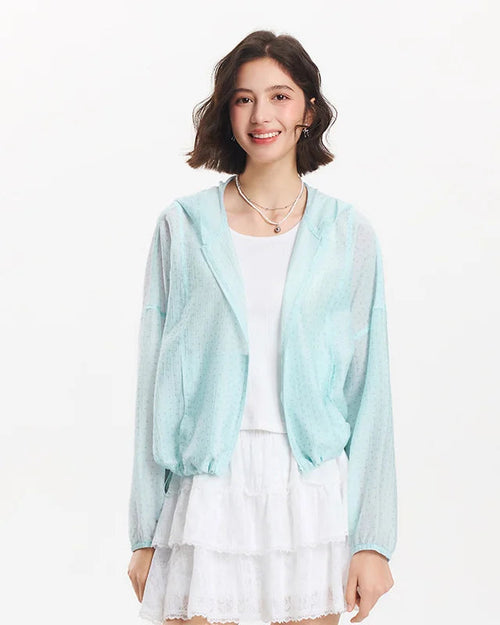 Lightweight Tencel-blend hooded jacket with floral texture, drawstring hem, and elastic cuffs. 
