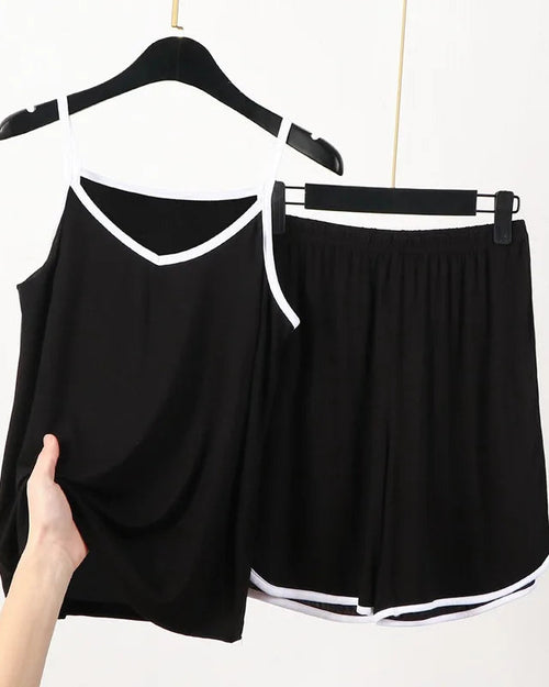 Women's Silky modal sling top and shorts pajama set featuring adjustable spaghetti straps, a relaxed fit, and matching short bottoms, perfect for breathable summer loungewear comfort.