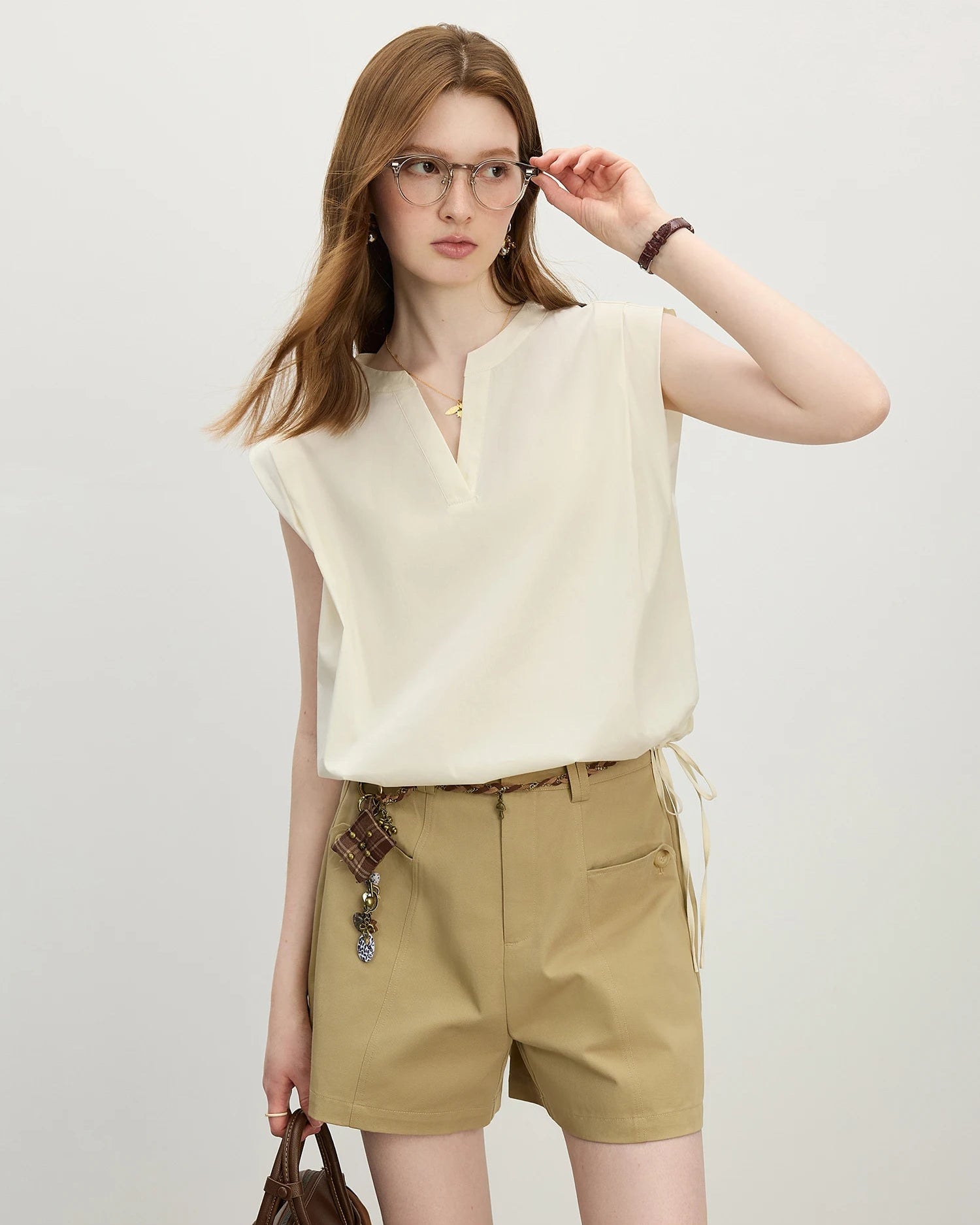 A breathable, lightweight summer top for women. Adjustable drawstring waist.