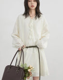 Loose-fit women's midi dress with V-neckline, lantern sleeves & A-line silhouette. 