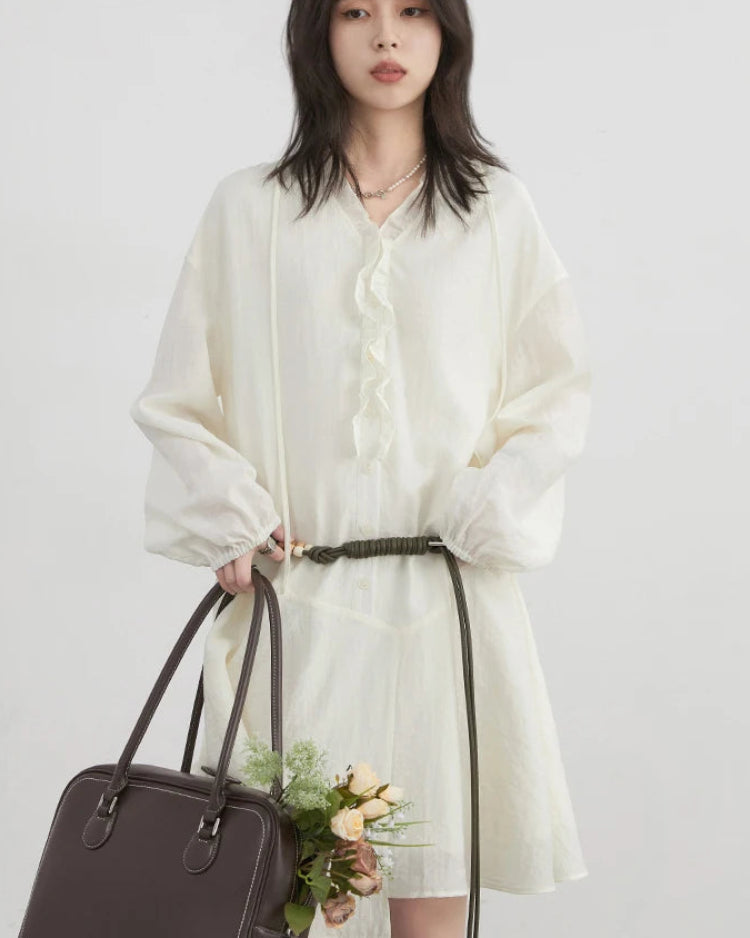 Loose-fit women's midi dress with V-neckline, lantern sleeves & A-line silhouette. 