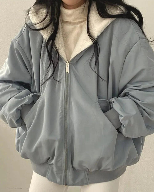 Thick fluffy cashmere-feel oversized double sided hooded jacket with zip closure and relaxed fit, perfect for winter warmth and effortless layering on city streets or weekend getaways.
