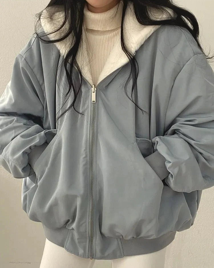 Thick fluffy cashmere-feel oversized double sided hooded jacket with zip closure and relaxed fit, perfect for winter warmth and effortless layering on city streets or weekend getaways.
