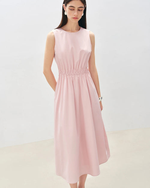 Women's sleeveless pleated A-line midi dress, featuring breathable fabric and cinched waist for summer office wear or resort vacation elegance.