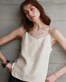 100% linen V-neck camisole with adjustable straps. Lightweight & breathable for effortless summer style, from casual days to beach escapes.