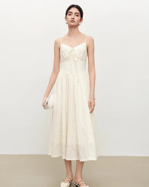 Women's white elegant lace slip dress, featuring a smooth polyester-nylon blend and delicate lace trim for refined French-inspired summer dates or evening parties.