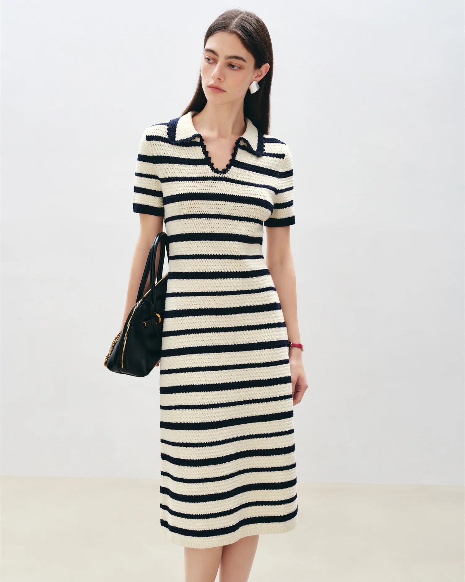 Women's white long striped polo collar knit dress, featuring soft cotton blend and empire waist fit-and-flare silhouette for effortless spring collegiate charm or morning commutes.
