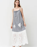 Sleeveless empire waist midi dress in a soft cotton-blend knit. Straight silhouette, mid-calf length.