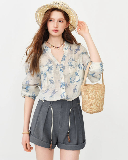 A slim, breathable summer shirt with button detail, perfect for casual outings and warm-weather everyday wear.