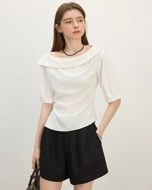 Chic white asymmetric collar shirt with crinkle detailing. Lightweight polyester blend, regular fit. Effortless office-to-casual style for women.
