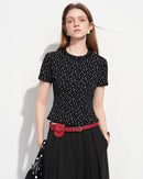  Premium black slim-fit floral short-sleeve t-shirt crafted from breathable pique cotton blend, offering a refined texture and stretchy comfort for a polished casual look.