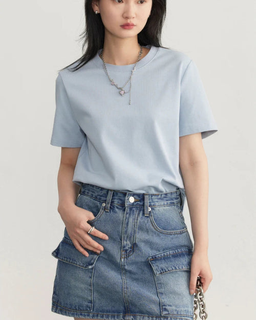 Soft cotton crew-neck tee with a relaxed straight silhouette.