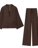 Women's V-neck shirt and high-waist wide-leg pants set crafted from lightweight polyester blended woven fabric, delivering effortless ease and poised polish for office meetings or weekend strolls.