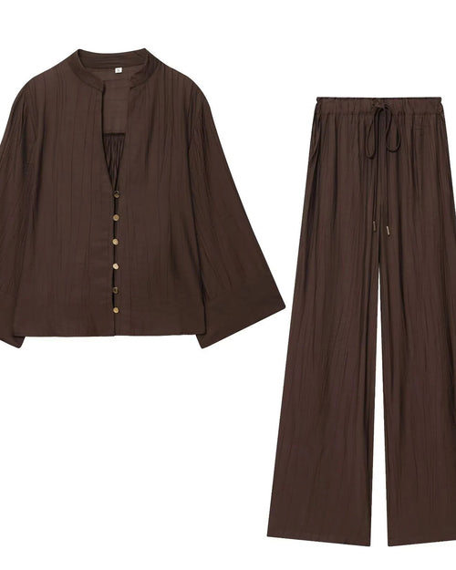 Women's V-neck shirt and high-waist wide-leg pants set crafted from lightweight polyester blended woven fabric, delivering effortless ease and poised polish for office meetings or weekend strolls.