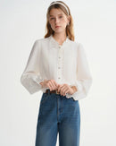 French-style viscose blouse with butterfly sleeves, half-high collar & tie-front detail. Flattering, loose fit for effortless autumn-winter elegance.