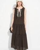 V-neck A-line maxi dress featuring an empire waist and full-length flowy silhouette. Crafted from a soft viscose polyester blend, this elegant long dress offers a flattering drape perfect for vacation and coastal summer wear.