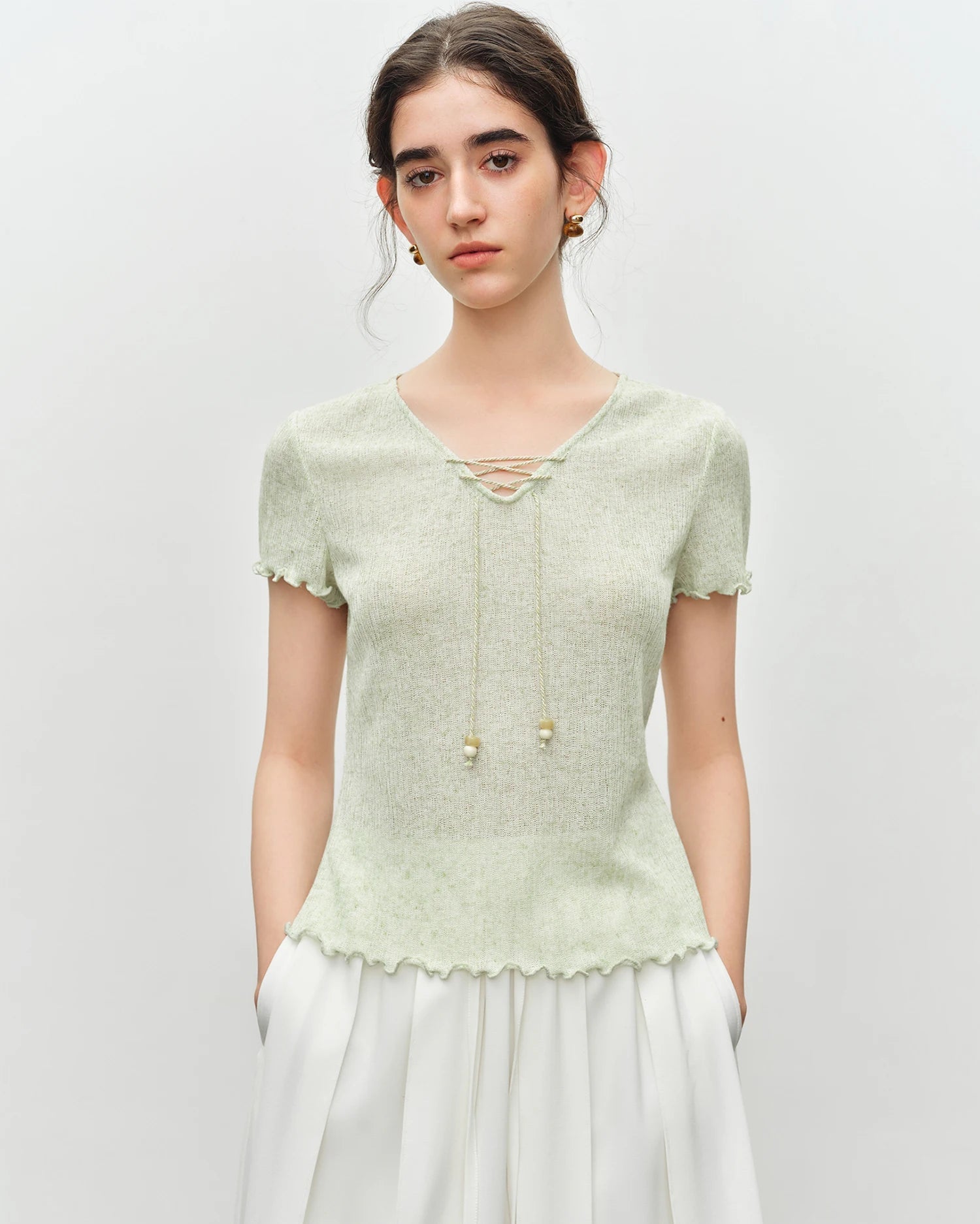 Women's beaded V-neck tie-front knit T-shirt, featuring lightweight polyester-linen blend and artisan boho charm for effortless beach mornings or evening outings.