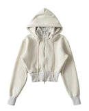 Women's Zip-up cropped sport jacket featuring a detachable hood, double zipper closure, and medium-weight knit polyester fabric, perfect for delivering sporty chic style in air-conditioned studios or city streets.