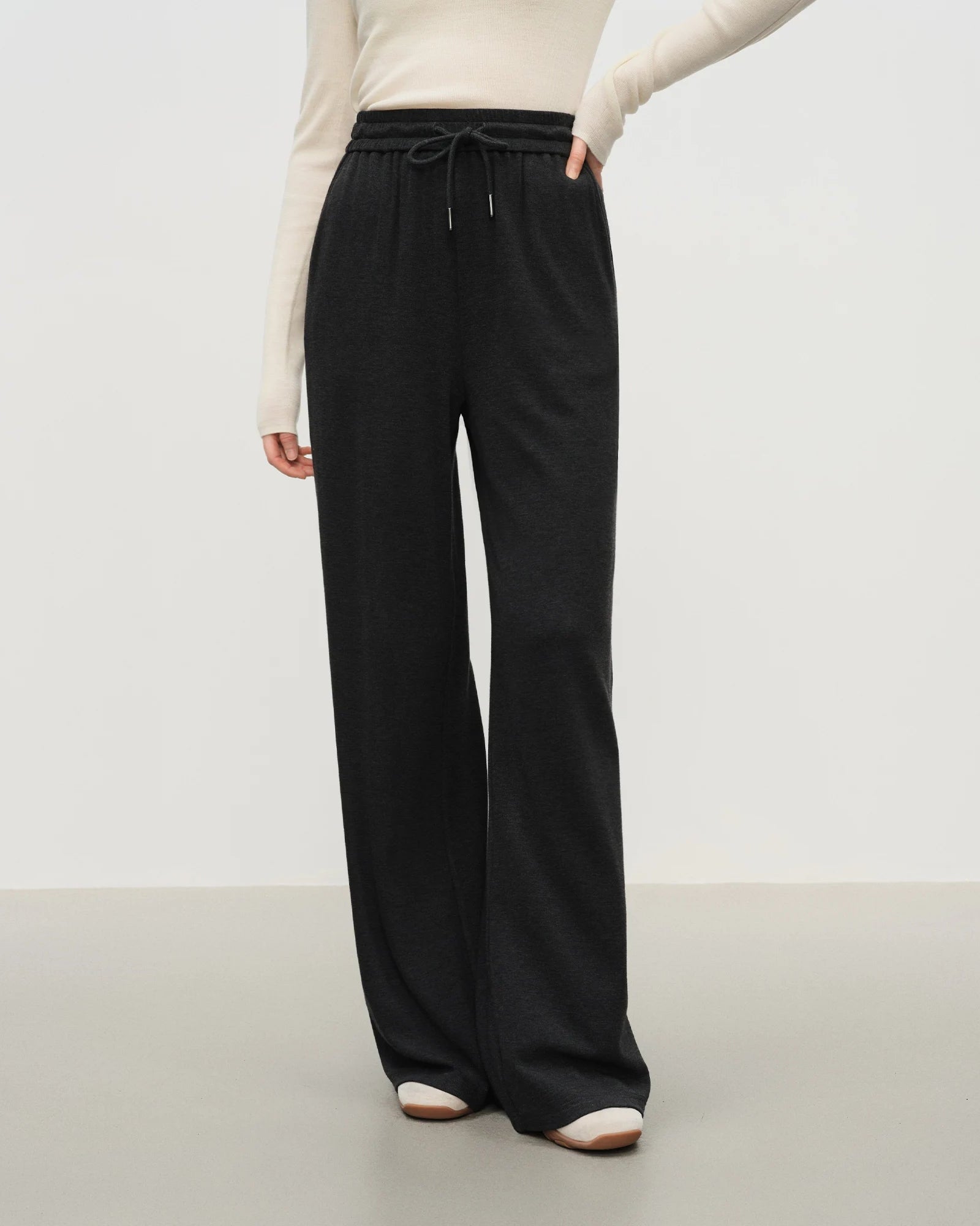 Women's dark grey high-waist wide-leg knit pants, featuring soft viscose-cotton blend and medium stretch for autumn sports-leisure or winter casual wear.
