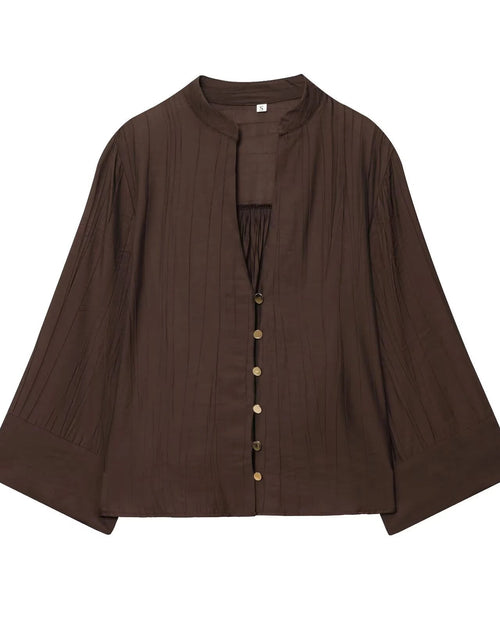 Women's Loose V-neck long-sleeve shirt crafted from lightweight polyester blended woven fabric, featuring a relaxed silhouette and single-button front that delivers poised elegance for office meetings or weekend outings.