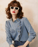 Elegant cotton blend ruffled stand-up collar denim shirt with an oblique placket and long sleeves, perfect for polished spring autumn office wear or casual elegant everyday styling.
