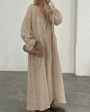 Our cotton lace-up flare sleeve maxi dress — a relaxed, ankle-length silhouette with V-neckline, pleated detailing, and elastic waist.