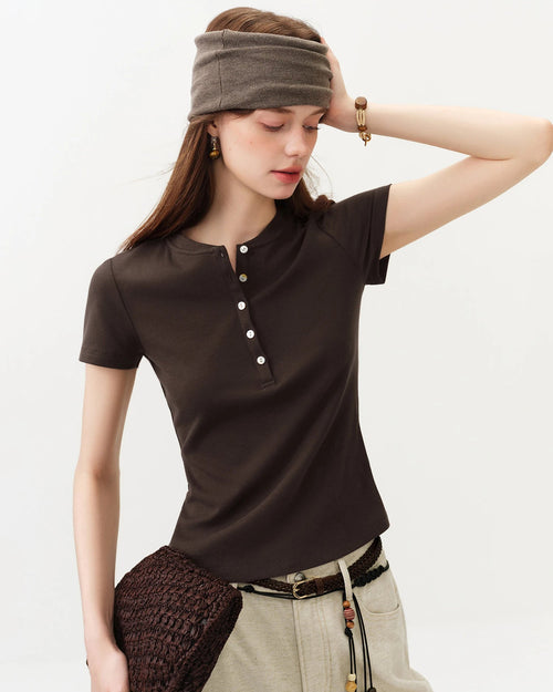 Fitted cotton-lyocell tee with mother-of-pearl button trim. Soft, breathable & slightly stretchy for polished office-to-casual summer wear.