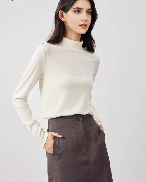 Wool-cotton-modal knit long-sleeve tee in mock neck. Climate-regulating, slim fit with medium stretch — a refined autumn-winter layering essential.