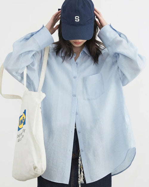Loose-Fitting Long-Sleeved Shirt With Open Back