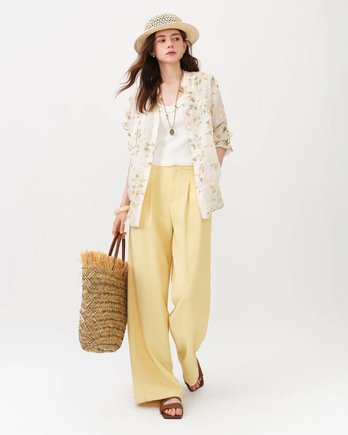 High-waist straight-leg trousers in flowy fabric with elastic waist. Polished drape for office commutes and casual summer days.