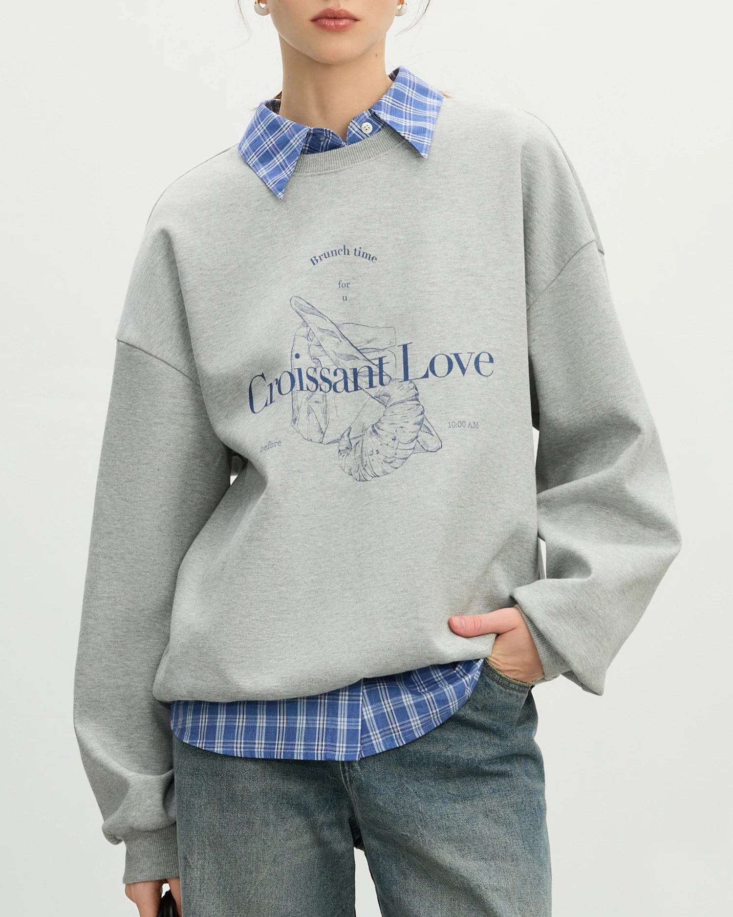 Premium loose-fit crewneck cotton sweatshirt crafted for effortless all-day comfort, offering a breathable blend and a subtle letter print for a clean, stylish aesthetic.