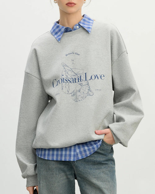 Premium loose-fit crewneck cotton sweatshirt crafted for effortless all-day comfort, offering a breathable blend and a subtle letter print for a clean, stylish aesthetic.