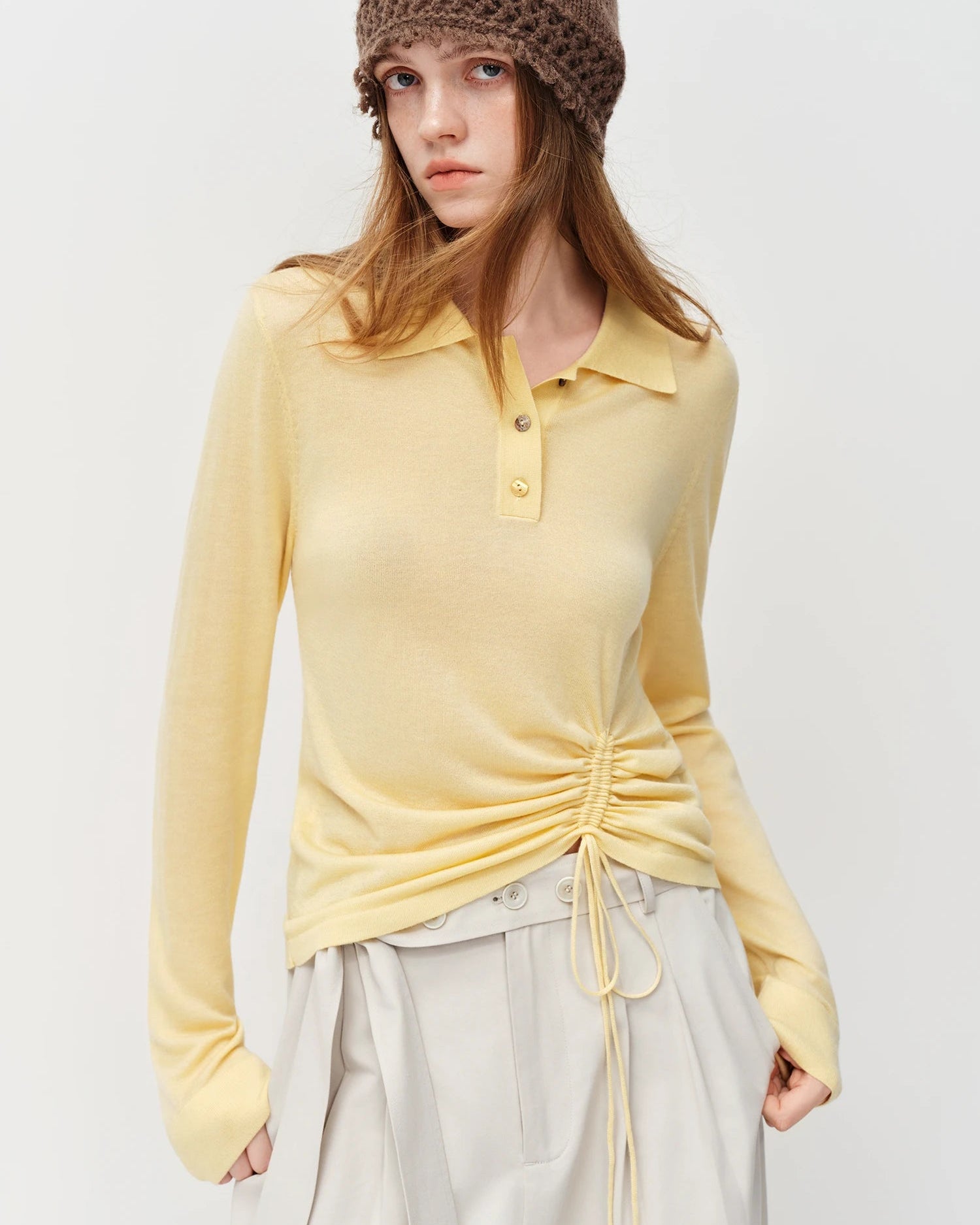 Refined polo collar knit top in a soft wool-silk blend. Regular fit, breathable, and office-ready.