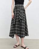 Women's black asymmetrical hem high-waisted A-line skirt, featuring breathable polyester-viscose blend and slight stretch for office mornings or weekend outings ease.