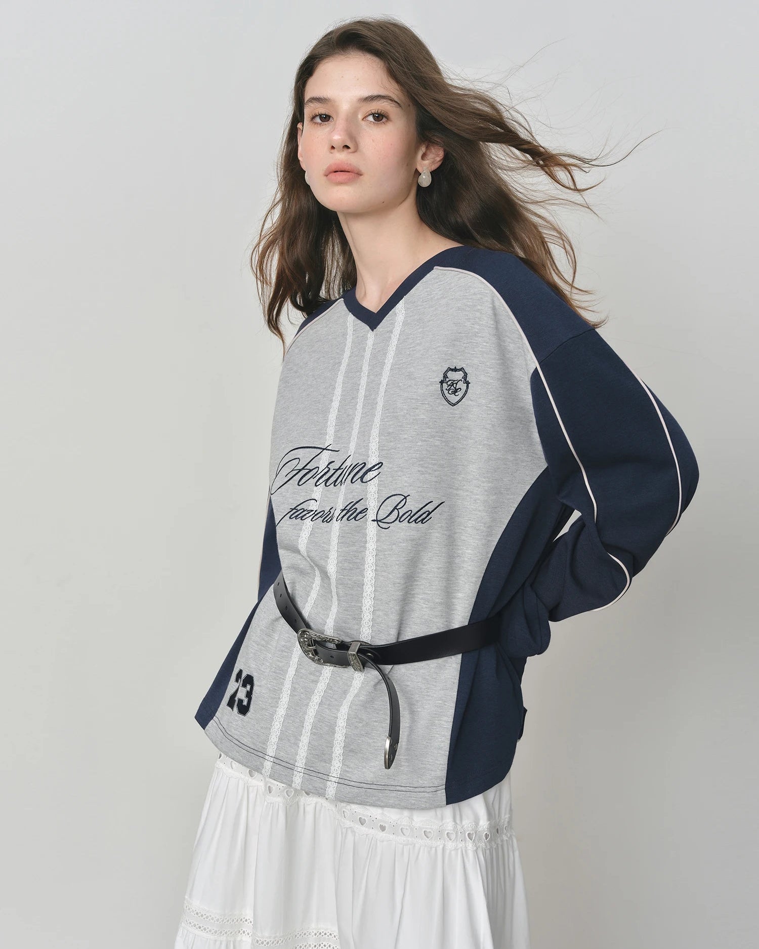 Premium loose-fit drop-shoulder sweatshirt crafted from a breathable cotton blend, offering a naturally oversized silhouette and a contrast letter print for a bold yet wearable fashion statement.