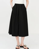 Pure cotton wide-leg casual pants featuring a pleated front and elasticated waistband. This pair of breathable trousers offers a relaxed A-line silhouette with a calf-length cut, perfect for creating a comfortable resort or summer look.