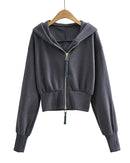 Women's Double-zip cropped hoodie jacket crafted from heavyweight cotton-blend knit, featuring a slim fit silhouette and double zipper closure that delivers poised street-ready style for air-conditioned studios or city streets.