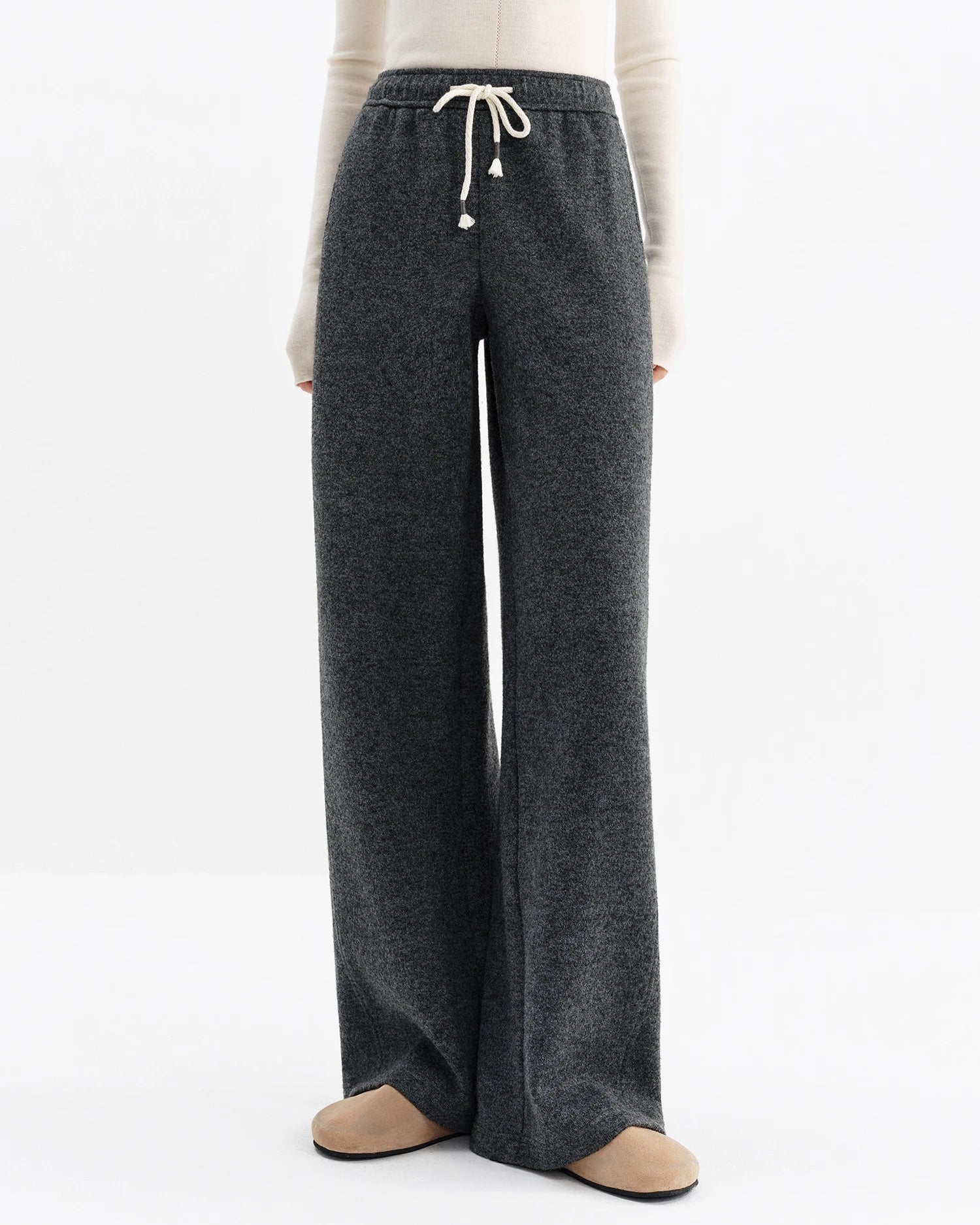 Women's gray high-waisted straight-leg wool-blend pants, featuring a drawstring waist and side pockets for winter office-casual wear or city to resort confidence.