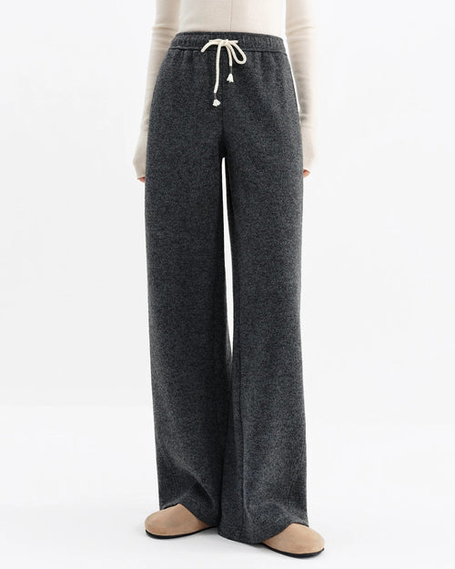 Women's gray high-waisted straight-leg wool-blend pants, featuring a drawstring waist and side pockets for winter office-casual wear or city to resort confidence.