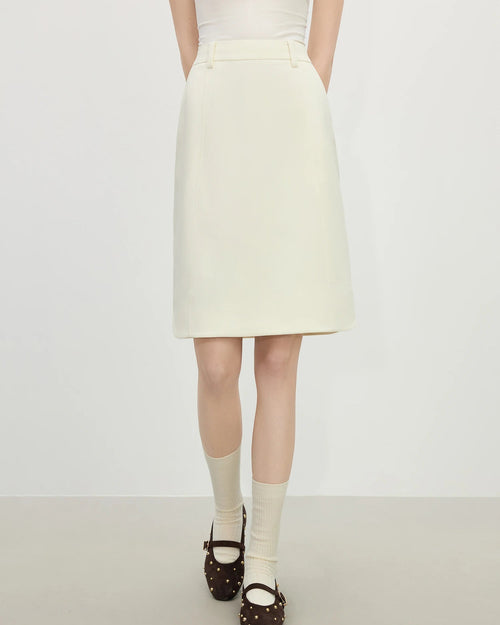 Beige slim-fit straight knee-length skirt crafted from smooth polyester, featuring a minimalist Old Money aesthetic and natural waistline, perfect for polished office wear or casual spring summer outfits.