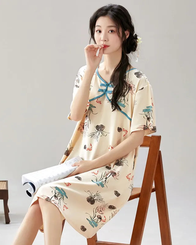 Women's vintage-inspired floral print cotton blend sleep dress featuring a classic notch collar, short sleeves, and a relaxed A-line cut, perfect for breathable summer loungewear comfort.