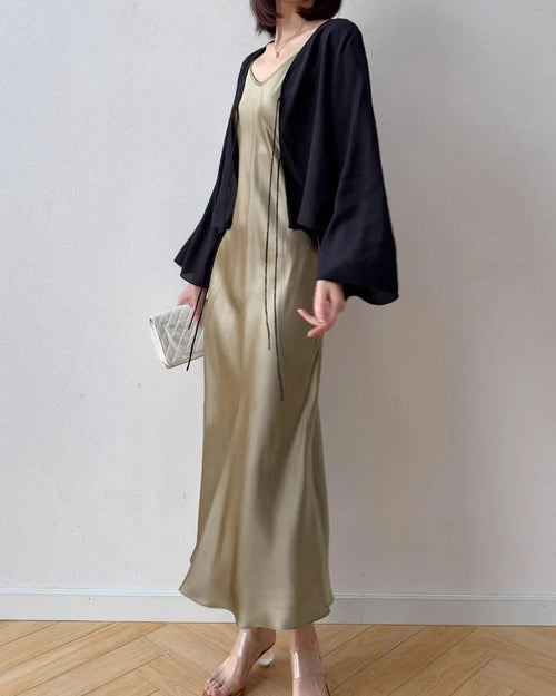 100% mulberry silk spaghetti strap V-neck fit-and-flare maxi dress. Fitted waist, flowing A-line skirt in 6 solid colours for spring & summer.