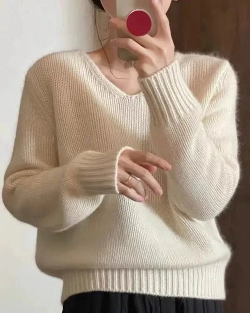 Women's  pure cashmere V-neck sweater in thick winter-weight loose fit, offering cloud-soft luxury warmth and effortless drape for fall and winter layering or refined everyday.