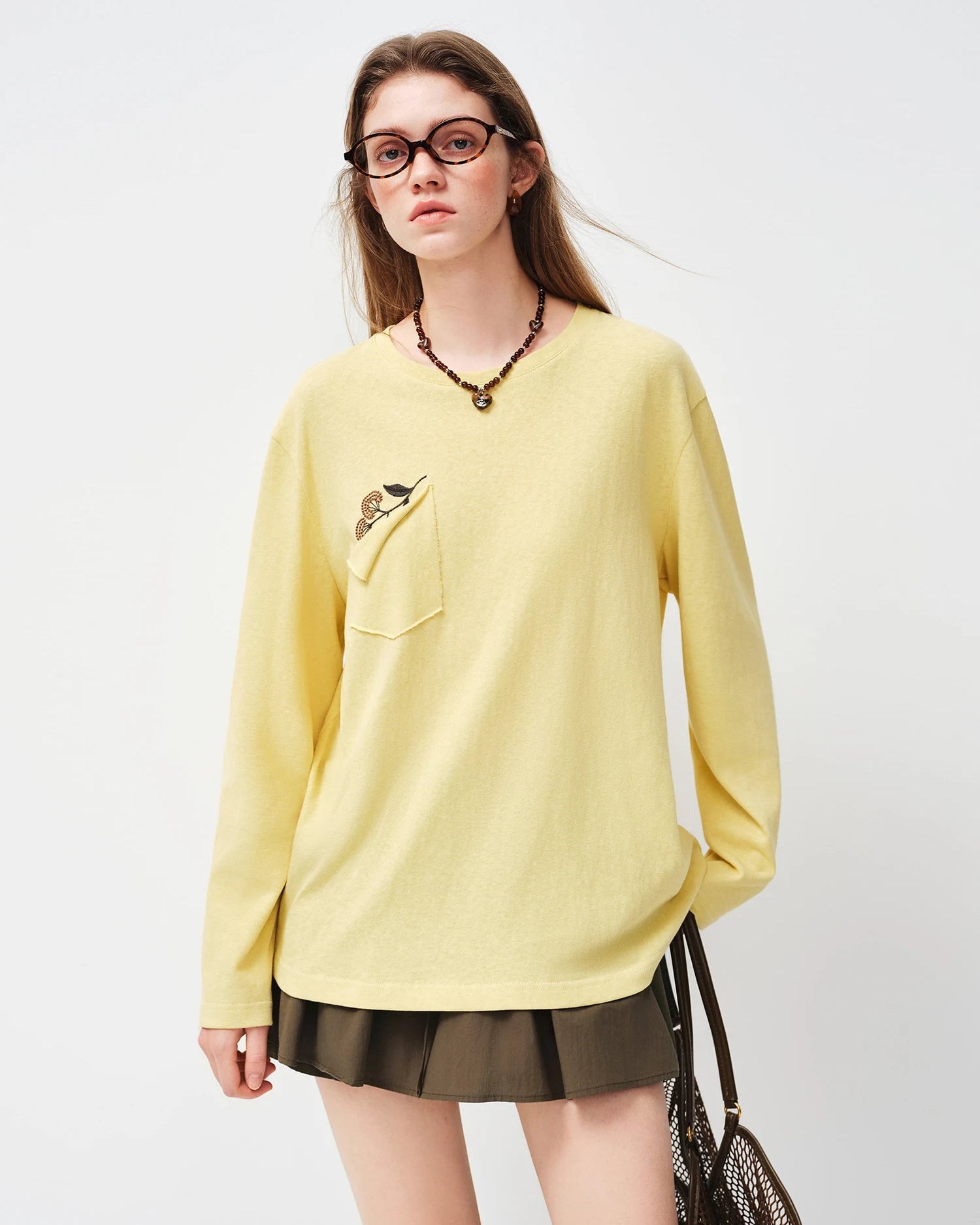 Breathable linen-feel cotton blend loose-fitting embroidered sun protection t-shirt with functional pockets, perfect for casual spring summer cover-ups or everyday.