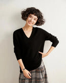 Woman brunching in a V-Neck Cashmere Pullover Sweater,  Mongolian cashmere drapes like silk—your luxe yet breathable 60-75 °F spring-fall layer.